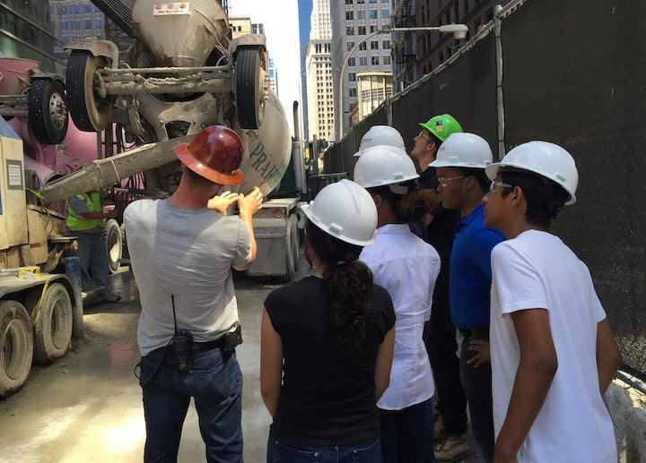 <p>The Companies that Care AIM High program familiarizes minority high school students with the construction industry. Image courtesy of Power Construction. </p>