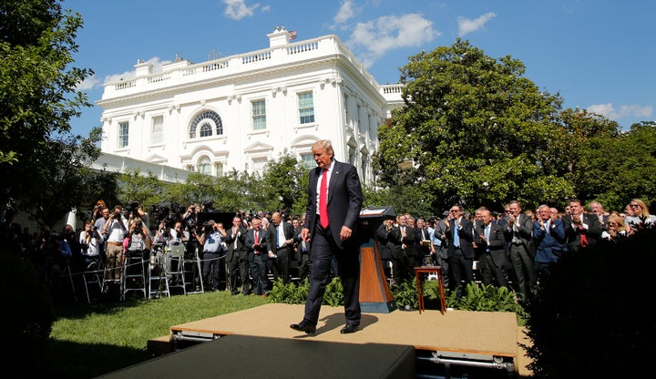 President Donald Trump leaves the Rose Garden of the White House on Thursday after announcing his decision that the United States will withdraw from the landmark Paris Agreement on climate change.