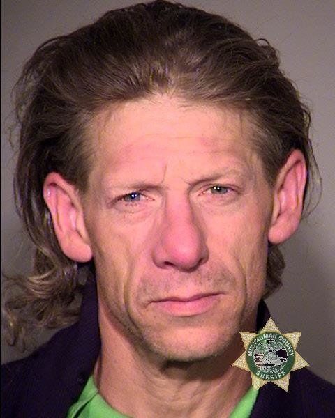 George Elwood Tschaggeny in a police booking photo.