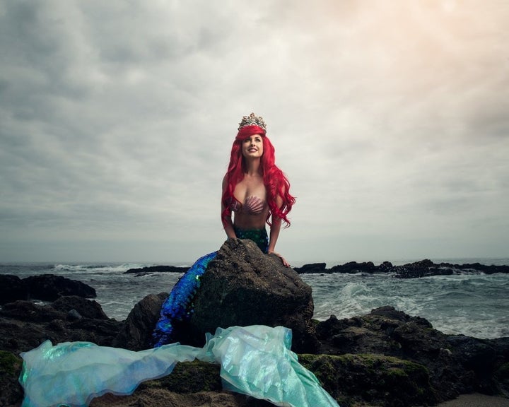 The Little Mermaid was played by model <a href="https://www.instagram.com/tracihines/?hl=en" target="_blank">Traci Hines</a>.