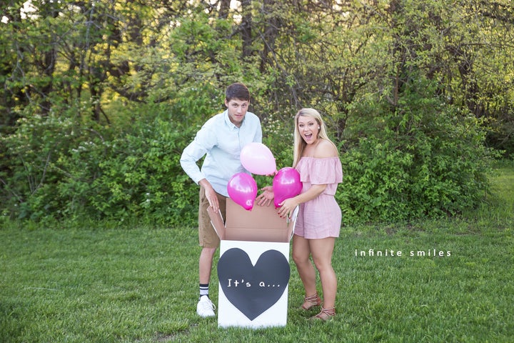 Pink balloons mean it's a girl!