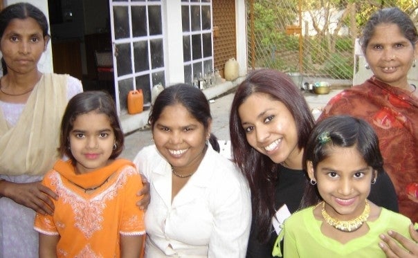 The ladies who worked for my grandfather and their children. It was my last day of summer vacation in India and I had told the children we will take pictures, so they came prepared looking their best. 