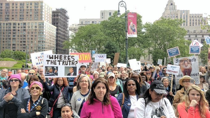 Hundreds of demonstrators in New York City took to the streets Saturday to protest President Donald Trump's ties with Russia. 