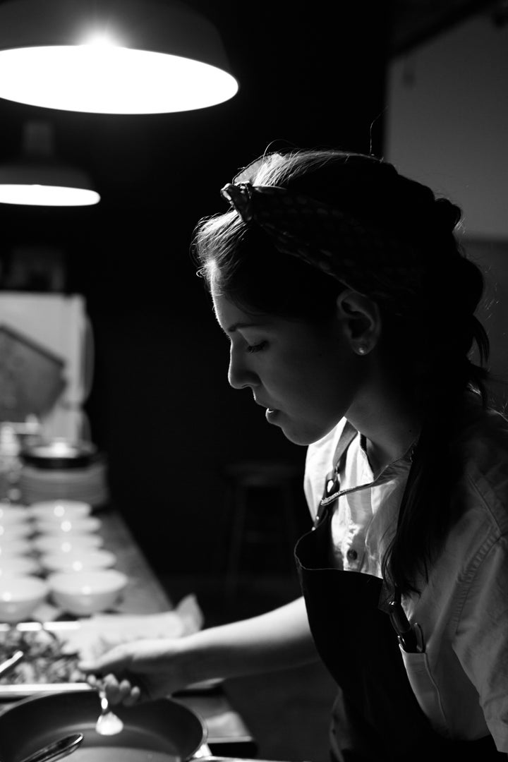 An artist and chef hard at work in the kitchen