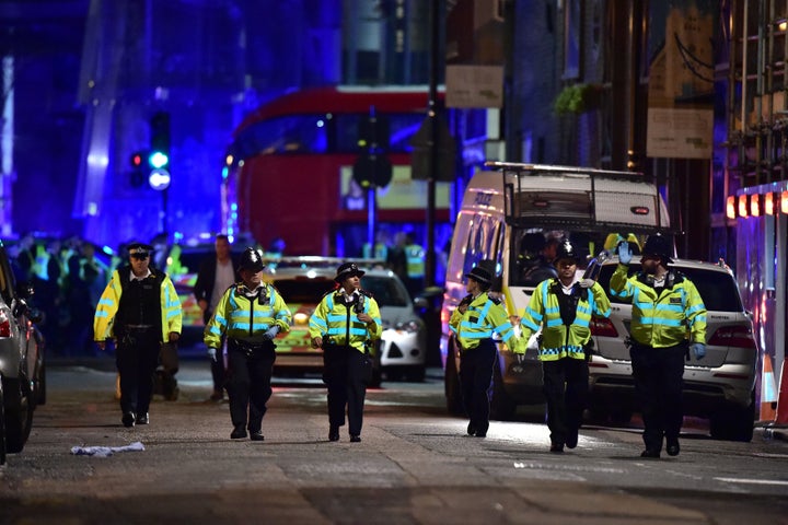 Police officers on Borough High Street in London as authorities responded to Saturday night's terrorist attack.