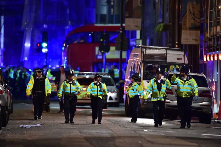 Police officers on Borough High Street as police were dealing with a "major incident" at London Bridge on Saturday night