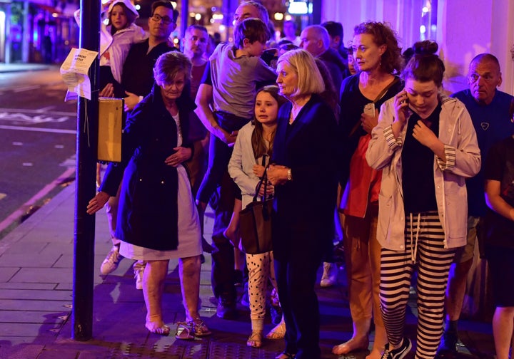 People walking down Borough High Street as police dealt with the incident at London Bridge