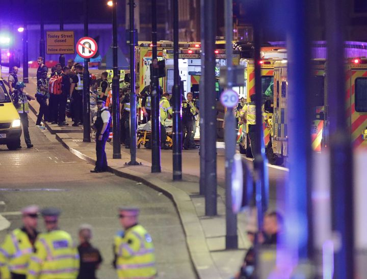 Emergency personnel tend to the injured on London Bridge