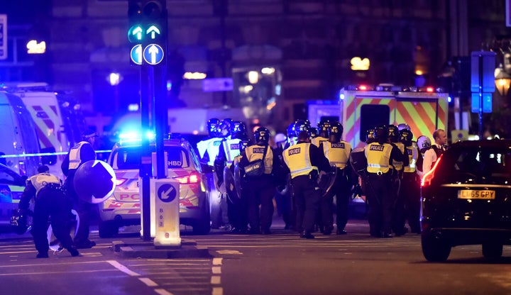 Police attend to an incident on London Bridge in London, that left several people dead.