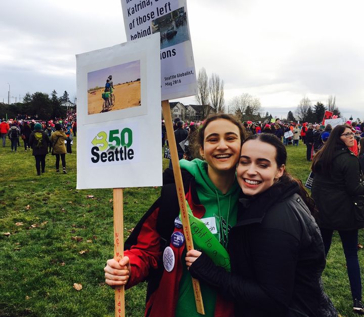 Marching with my friend for climate justice.