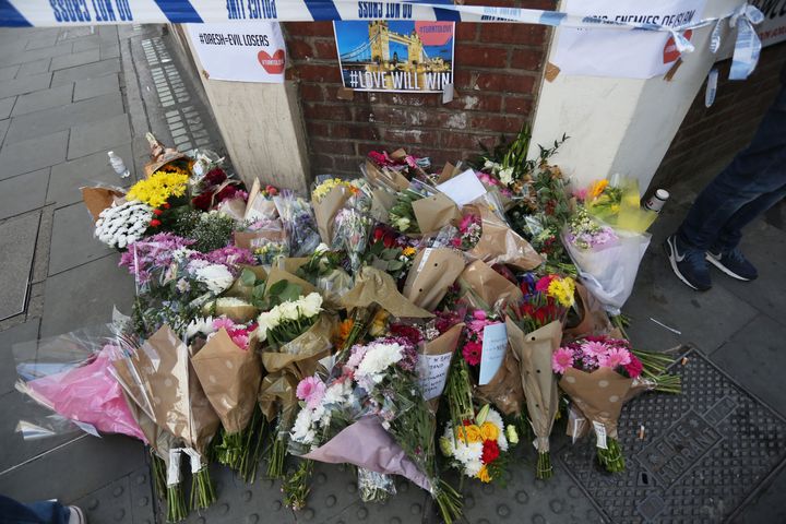 Members of the public have laid flowers near Borough Market to remember those lost in the attack 
