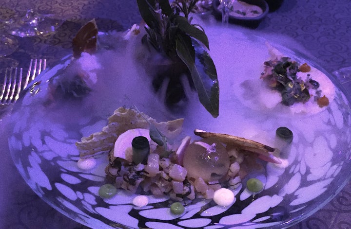 Smoked marlin salad, soft jicama taco with shrimp, marinated watermelon with iberico ham, emerging from dry ice vapor 