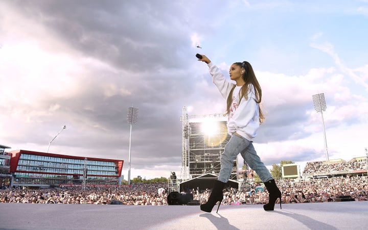 Ariana Grande performs at the "One Love Manchester" benefit concert on Sunday.