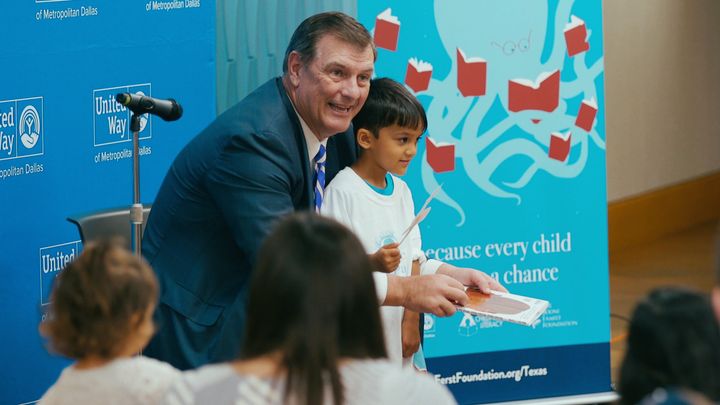 Dallas Mayor Mike Rawlings reads to children at the Once Upon a Month book launch at the J Erik Jonsson Library in Dallas