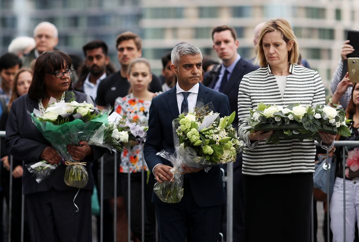L-R: Shadow Home Secretary Diane Abbott, Khan and Home Secretary Amber Rudd lay flowers at the vigil