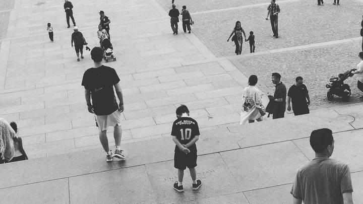 Our son reflecting on the Dream, where Dr. King gave his speech on the steps of the Lincoln Memorial, Aug. 28, 1963