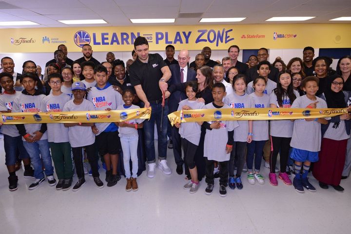 NBA Commissioner Adam Silver and Golden State Warriors Zaza Pachulia cut the ribbon on a new NBA Cares Learn & Play Center at Westlake Middle School in Oakland.