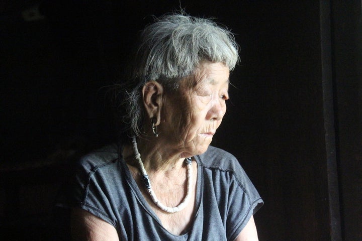 Kherepe Meme looks in the direction of the river Ephe from her home in Kebali village.