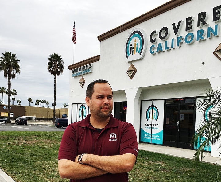 George Balteria stands in front of his Huntington Beach store.