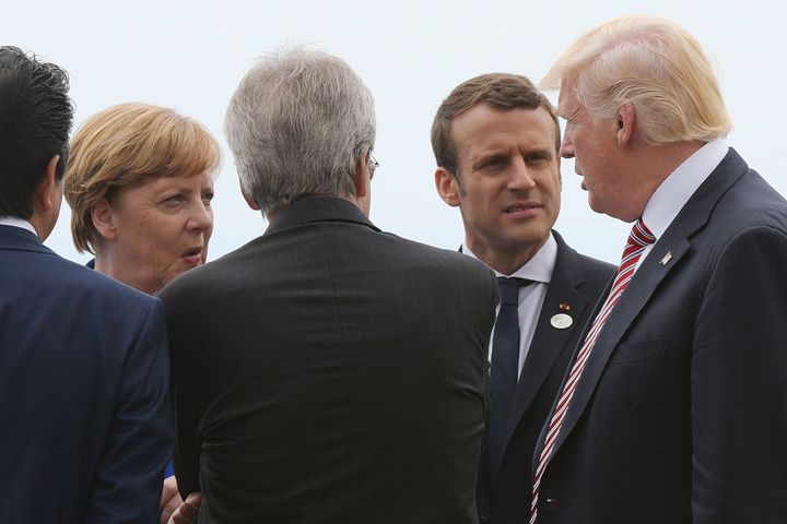 German Chancellor Angela Merkel and French President Emmanuel Macron reportedly urged Trump to reconsider withdrawal from the Paris Agreement.