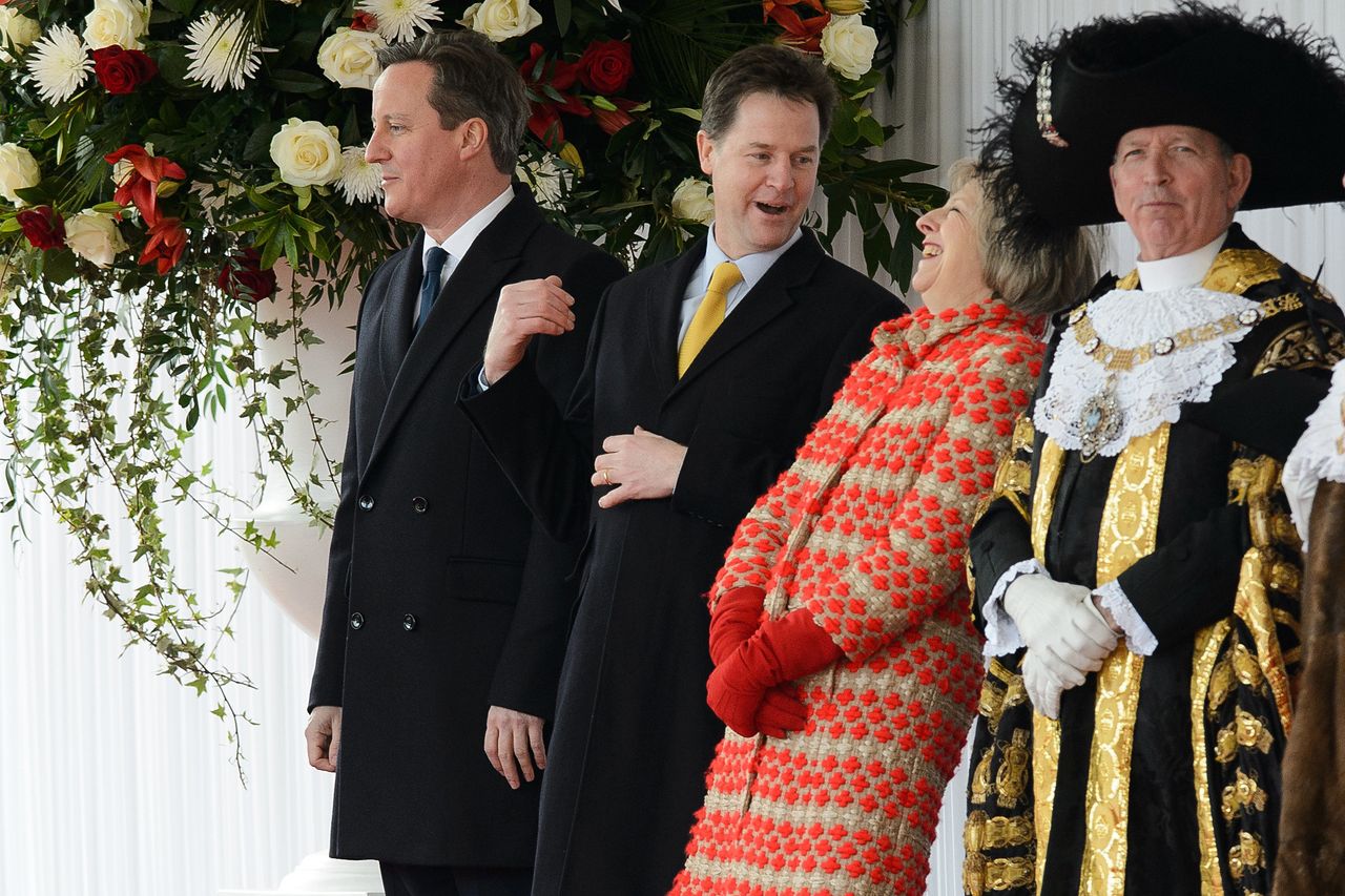 Nick Clegg shares a joke with then home secretary Theresa May before the arrival of the President of Mexico on a state visit during the coalition years.