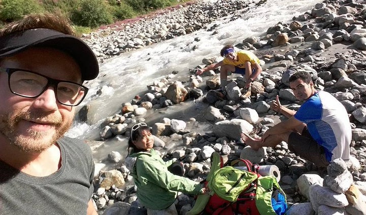 Scouting the trails in the Caucasus Mountains in Georgia with men.