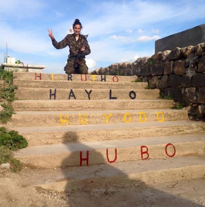 On her way to Raqqa she wrote Hirutho, Haylo, Huyodo, Hubo which means Freedom, Strength, Unity and Love