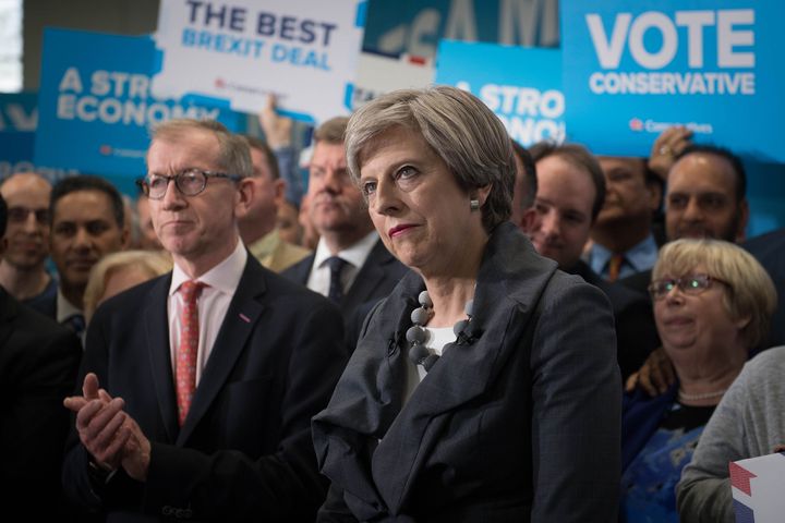 Theresa May told a rally in Slough: 'If our human rights laws stop us from doing it, we will change the laws so we can do it.'