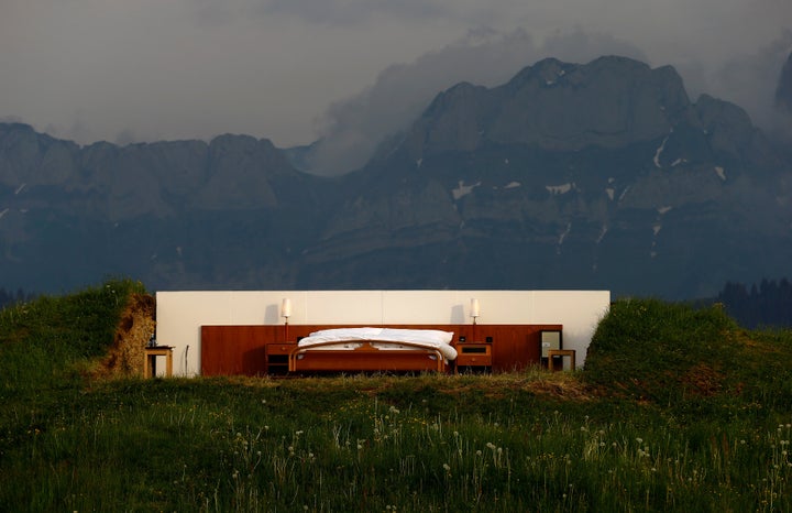 The bedroom sits on an alp near Gonten, Switzerland. 