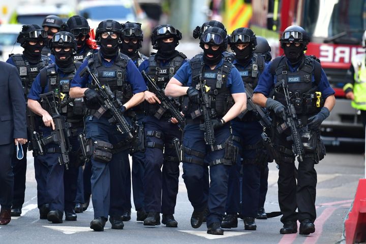Armed police on St Thomas Street, London, near the scene of the London Bridge attack. May gave her speech amid questions over why the three terrorists were able to carry it out.