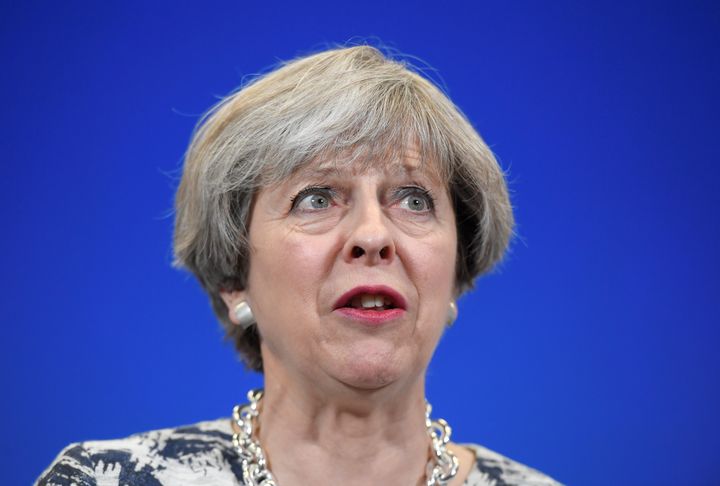 British Prime Minister Theresa May's snap vote gamble backfired, leaving her weakened government scrambling to join forces with Northern Ireland's Democratic Unionist Party.