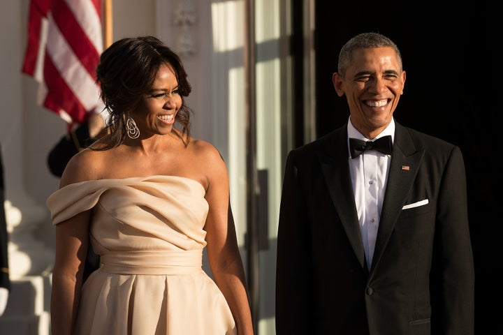 First Lady Michelle Obama and U.S. President Barack Obama wait for leaders to arrive for the Nordic state dinner on the North Portico at the White House, May 13, 2016, in Washington, DC.