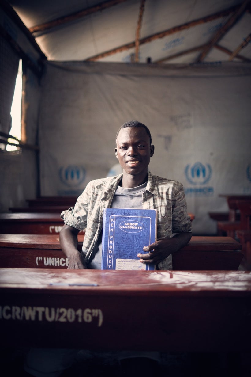 David with his exercise book which he brought from South Sudan