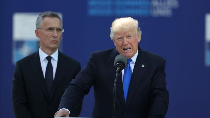 U.S. President Donald Trump speaks as Jens Stoltenberg, secretary general of the North Atlantic Treaty Organization (NATO), looks on, May 25, 2017.