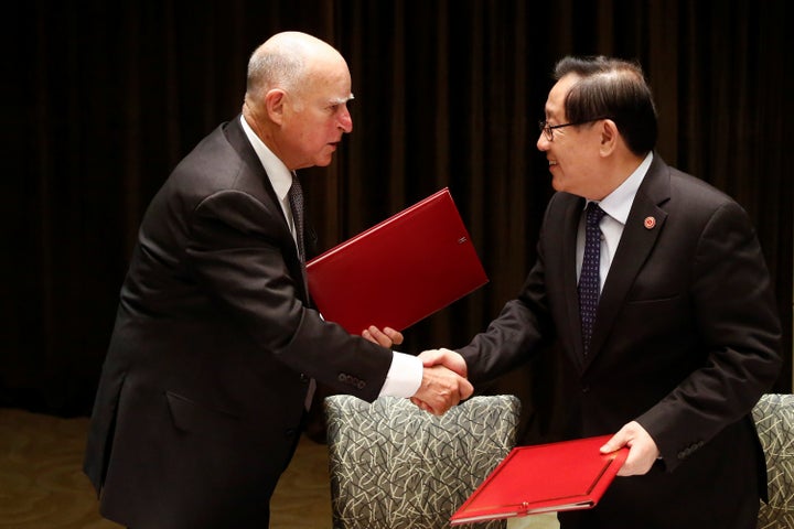 California Gov. Jerry Brown and Chinese Minister of Science and Technology Wan Gang attend a signing ceremony at the Internat