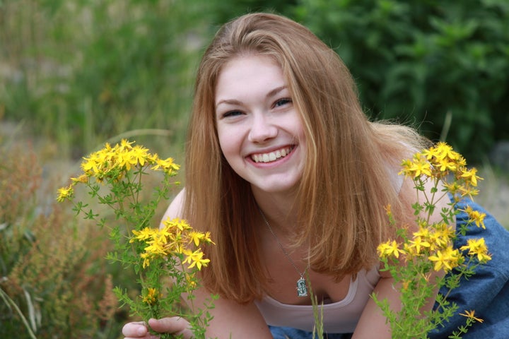 A field of flowers brings happiness to Mattie Friday.