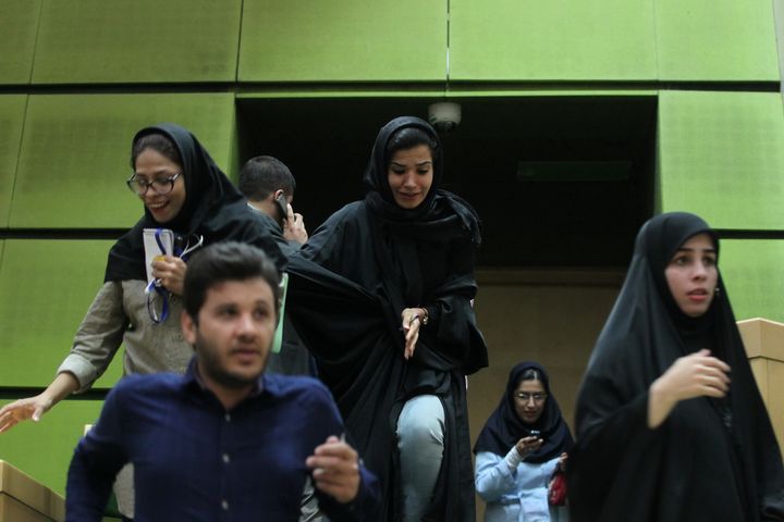 People inside Iran's Parliament on June 7, 2017, during a terror attack that was later claimed by ISIS. Coupled with another attack on the Mausoleum of Ayatollah Khomeini, at least 12 people died.