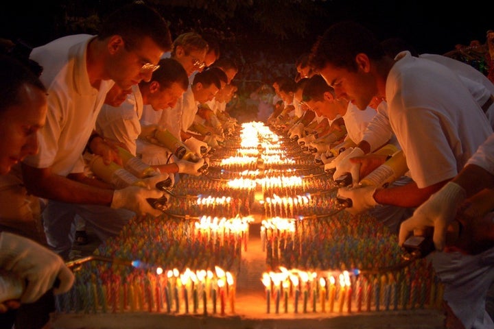 27,000 birthday candles are lit to set a new Guinness record in New York, in 2005.