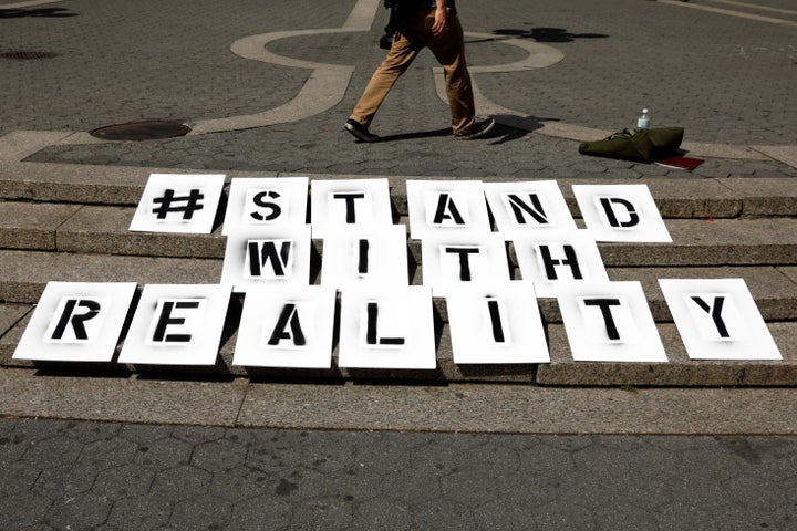 A sign rests on steps during a demonstration supporting Reality Winner in New York on Wednesday.