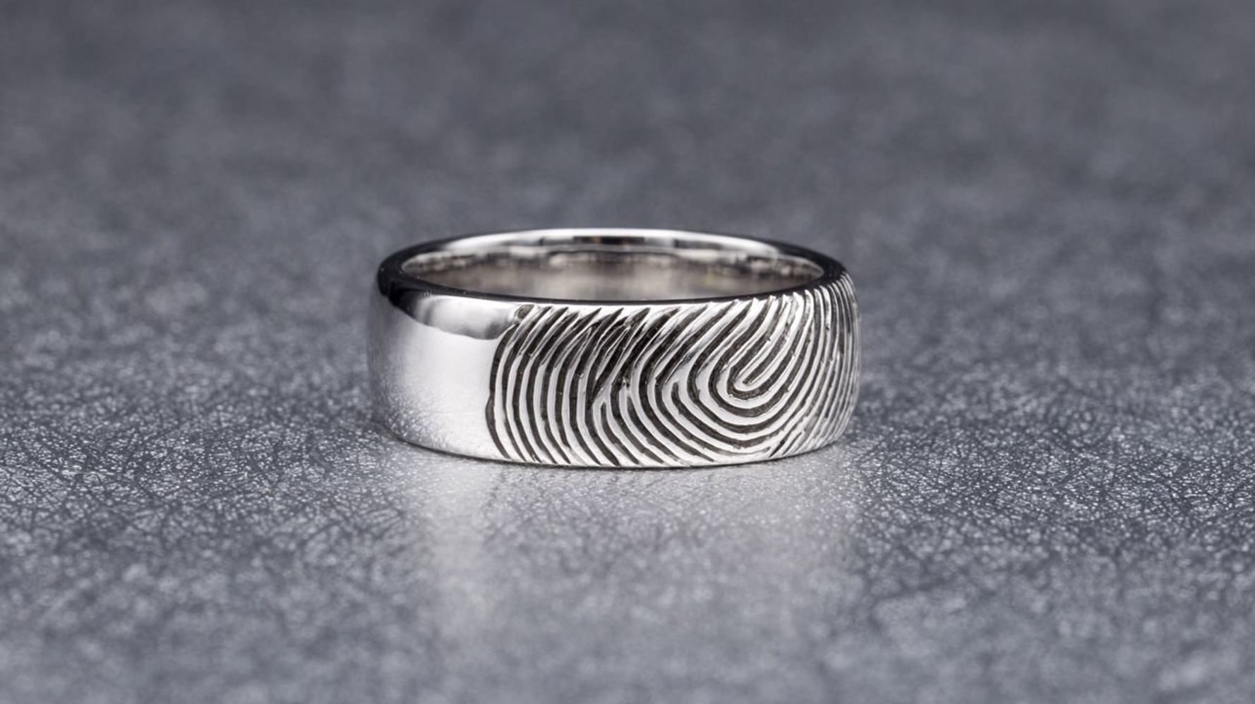 Sweet Husband Got His Wife's Fingerprint Etched Onto His Wedding Band.