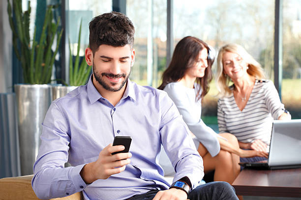New research from USC's Marshall School of Business explains what your colleagues are thinking when you use your phone during