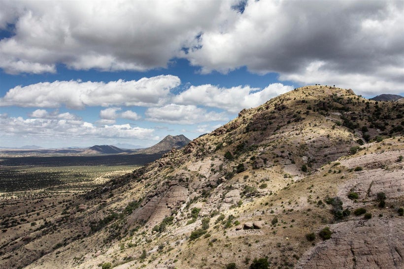 The trail winds down below the pass offering huge views of the surrounding desert.