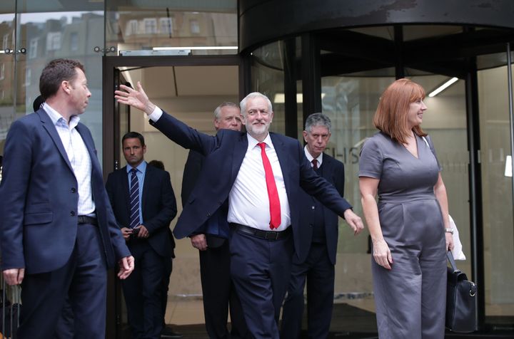 Jeremy Corbyn leaves Labour Party HQ in central London after he reiterated his call for Theresa May to resign as Prime Minister.