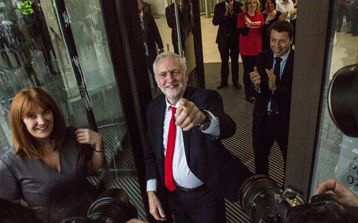 Jeremy Corbyn celebrates the unprecedented and surprising victories of the Labour party Friday morning at the party’s headquarters.