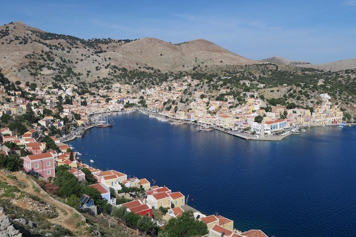 <p>The picturesque harbour at Symi</p>