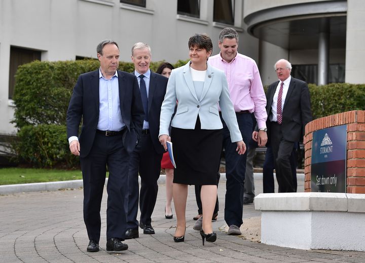 DUP leader and Northern Ireland former First Minister Arlene Foster (C) arrives at the Stormont Hotel with the DUP's newly elected Westminster MPs.