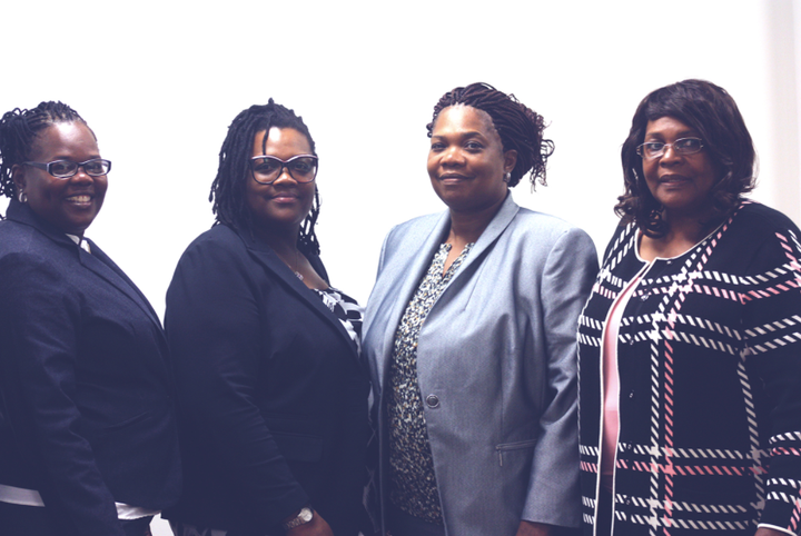 Pearlie Mae Smith (far right) and her children won the Powerball jackpot.