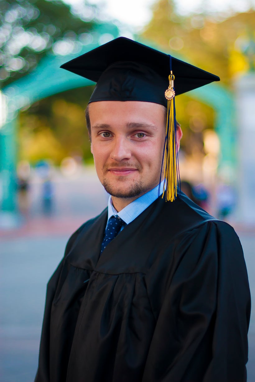 Kirill is pictured here in his graduation gap in front of the iconic Sather Gate on the UC Berkeley campus, the university he