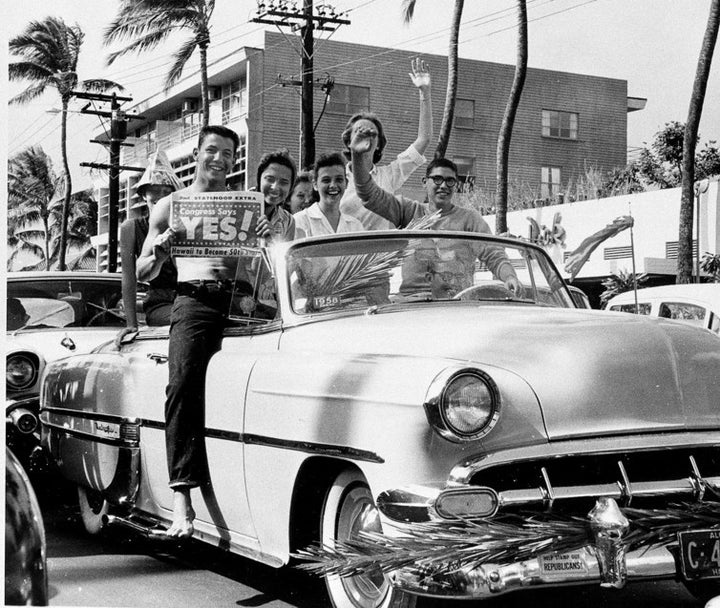 Celebrating Hawaii’s statehood in Waikiki, Honolulu, on March 13, 1959. Hawaii became the 50th state on Aug. 21, 1959.