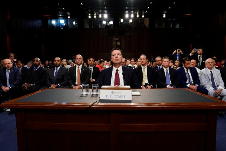 Former FBI Director James Comey testifies before a Senate Intelligence Committee hearing on Russia's alleged interference in